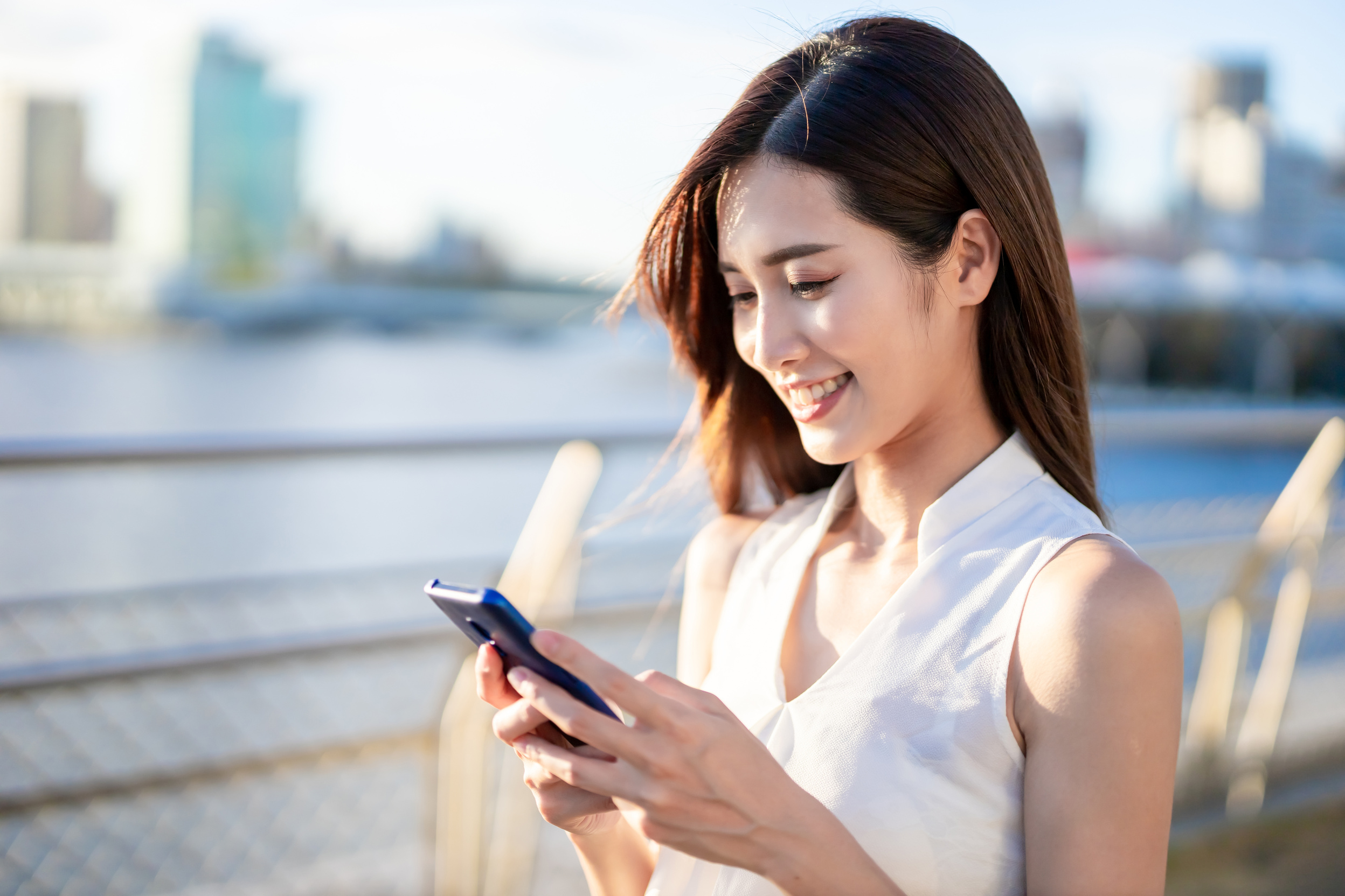 Woman Using Smartphone Outdoors